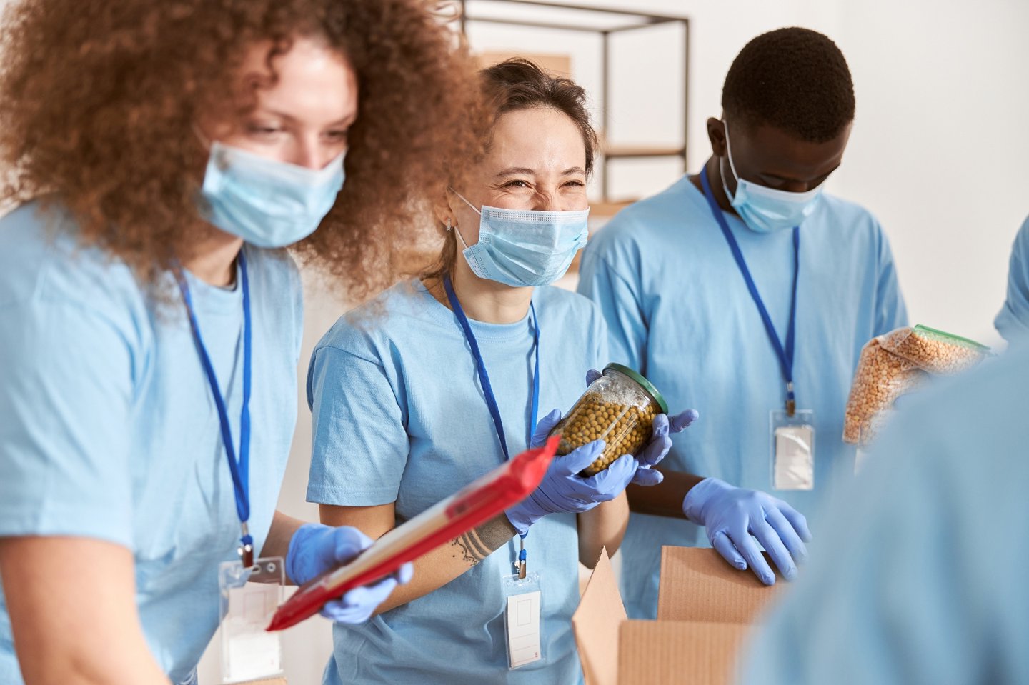 cheerful-woman-volunteer-in-blue-uniform-protecti-2023-11-27-04-50-35-utc 1-1